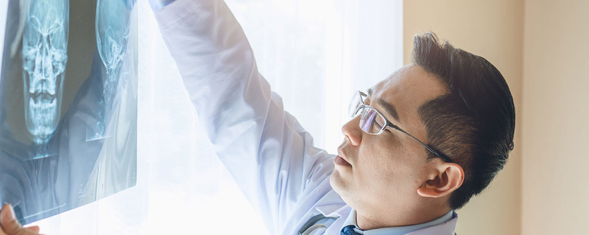 Doctor Looking At Xrays