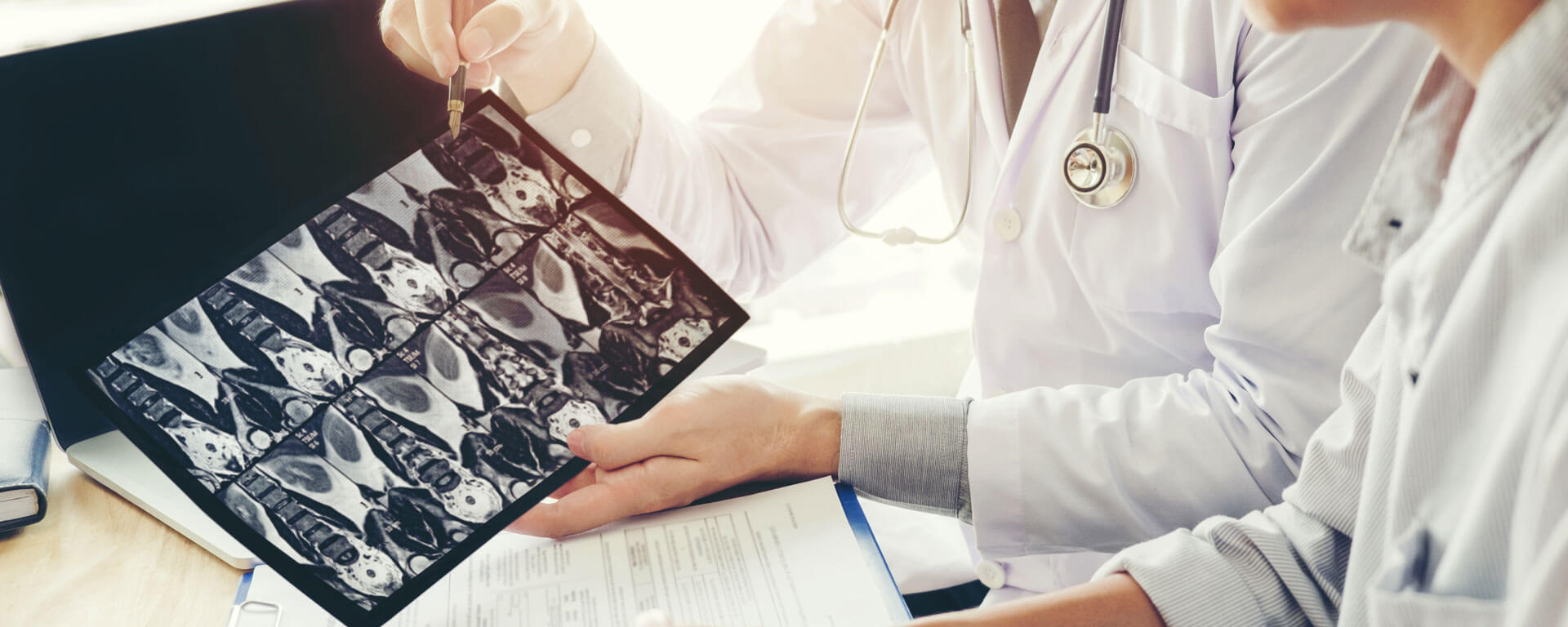 Doctors Looking Over Xrays